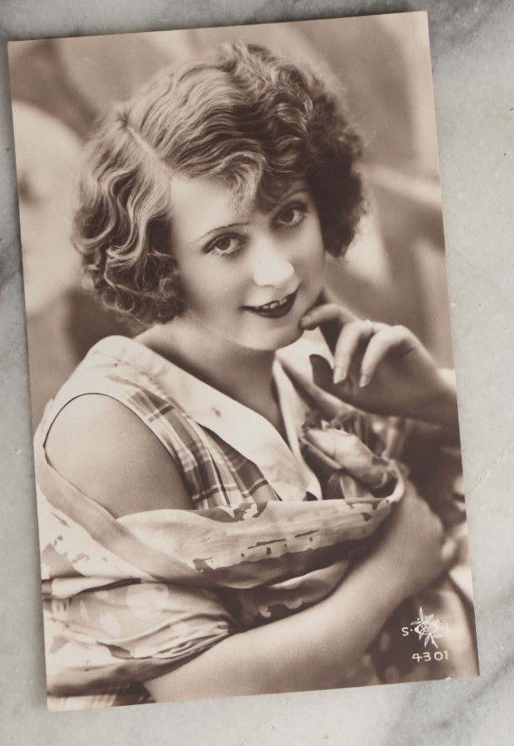 Lot 081 - Grouping Of Ten Antique And Vintage Photographic Postcards Of Women Including Girl With Cats, Woman In Costume, And Woman In Swimsuit, Etc., (Grouping A)