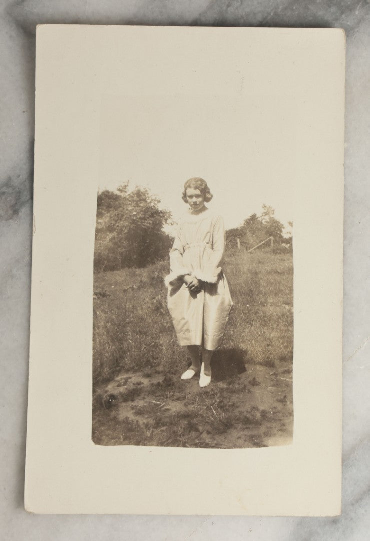 Lot 081 - Grouping Of Ten Antique And Vintage Photographic Postcards Of Women Including Girl With Cats, Woman In Costume, And Woman In Swimsuit, Etc., (Grouping A)