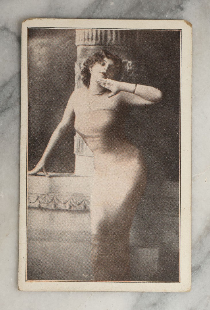 Lot 082 - Grouping Of Ten Antique And Vintage Photographic Postcards Of Women Including Gypsy Woman, Woman In Mask, "Are You Game," Etc., (Grouping B)