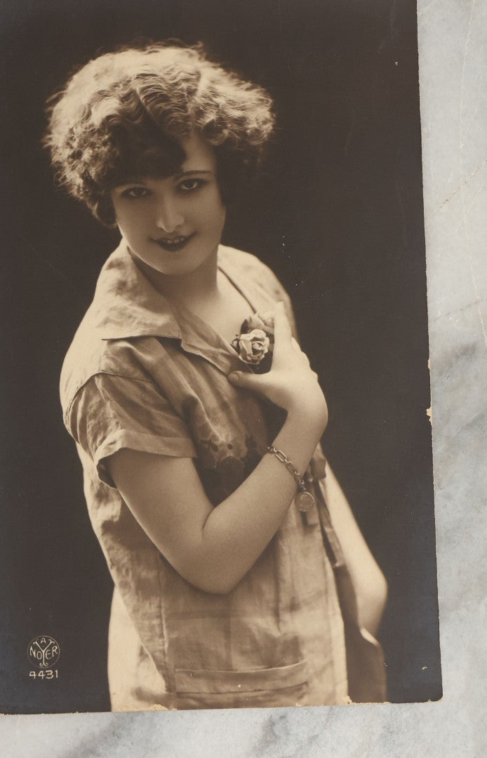 Lot 082 - Grouping Of Ten Antique And Vintage Photographic Postcards Of Women Including Gypsy Woman, Woman In Mask, "Are You Game," Etc., (Grouping B)