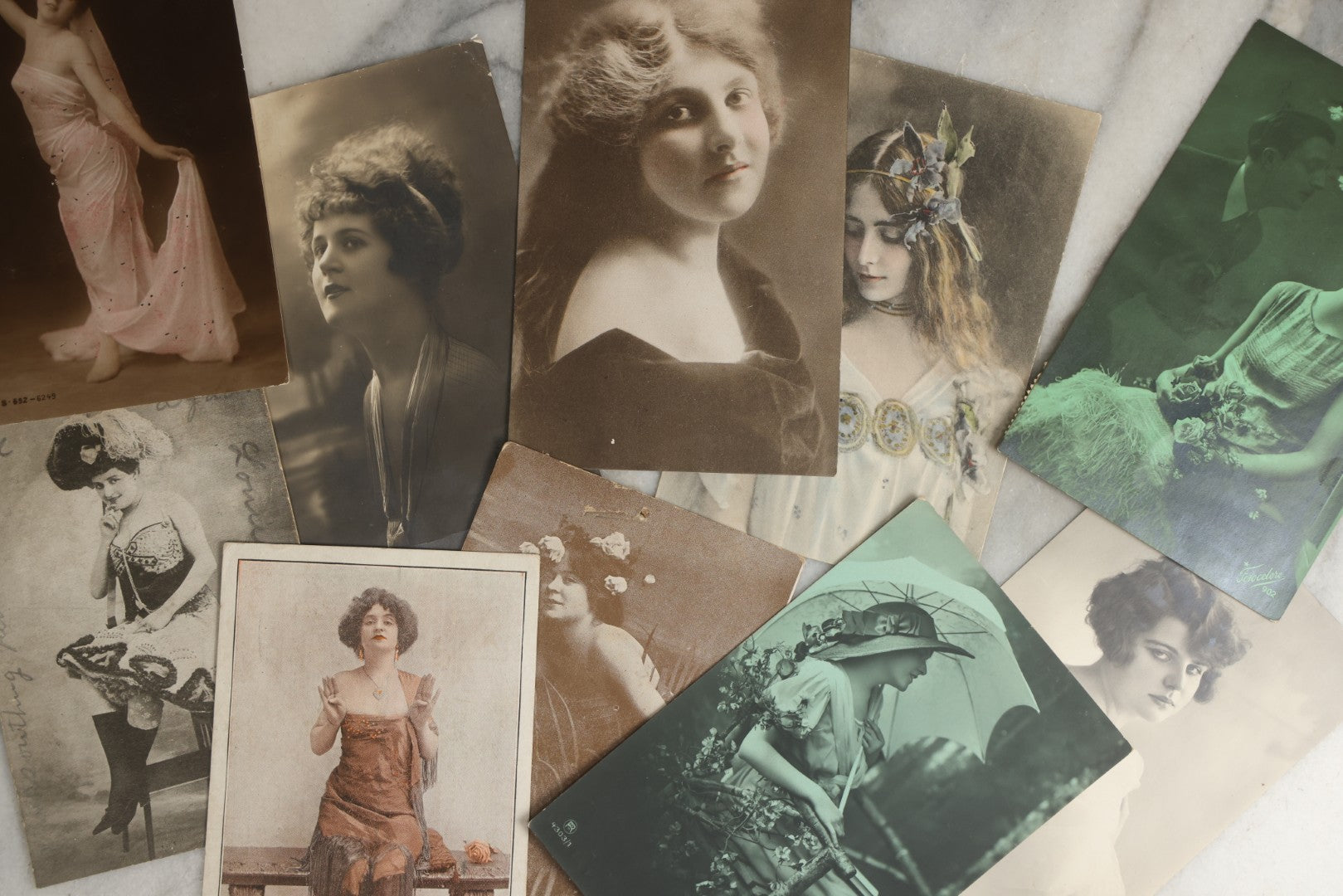 Lot 083 - Grouping Of Ten Antique And Vintage Photographic Postcards Of Women Including Cards With Green Tint, Girl With Flower In Her Hair, Etc., (Grouping C)