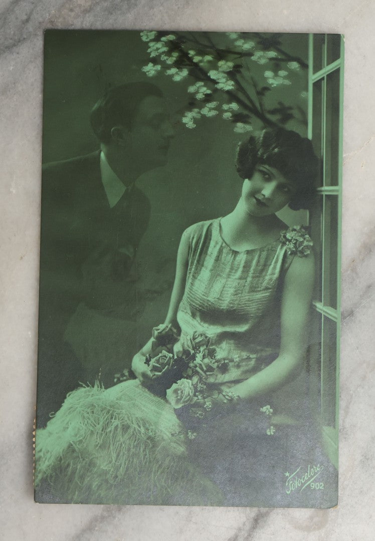 Lot 083 - Grouping Of Ten Antique And Vintage Photographic Postcards Of Women Including Cards With Green Tint, Girl With Flower In Her Hair, Etc., (Grouping C)