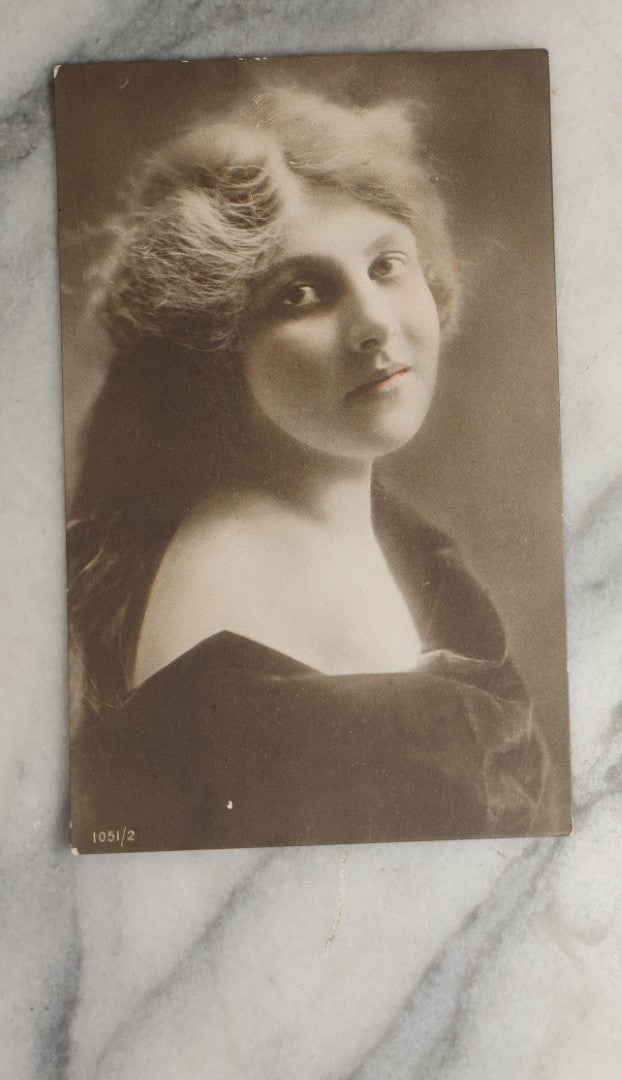 Lot 083 - Grouping Of Ten Antique And Vintage Photographic Postcards Of Women Including Cards With Green Tint, Girl With Flower In Her Hair, Etc., (Grouping C)