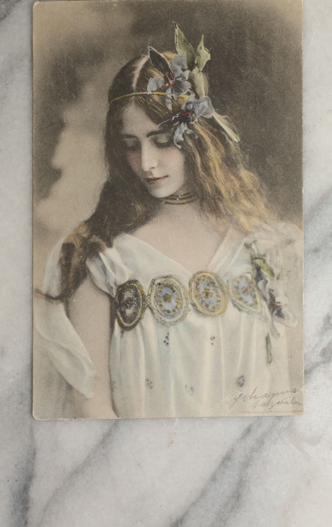 Lot 083 - Grouping Of Ten Antique And Vintage Photographic Postcards Of Women Including Cards With Green Tint, Girl With Flower In Her Hair, Etc., (Grouping C)