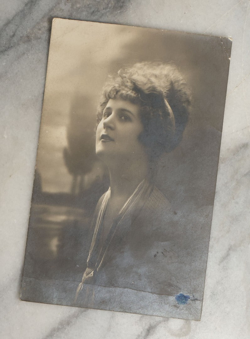 Lot 083 - Grouping Of Ten Antique And Vintage Photographic Postcards Of Women Including Cards With Green Tint, Girl With Flower In Her Hair, Etc., (Grouping C)