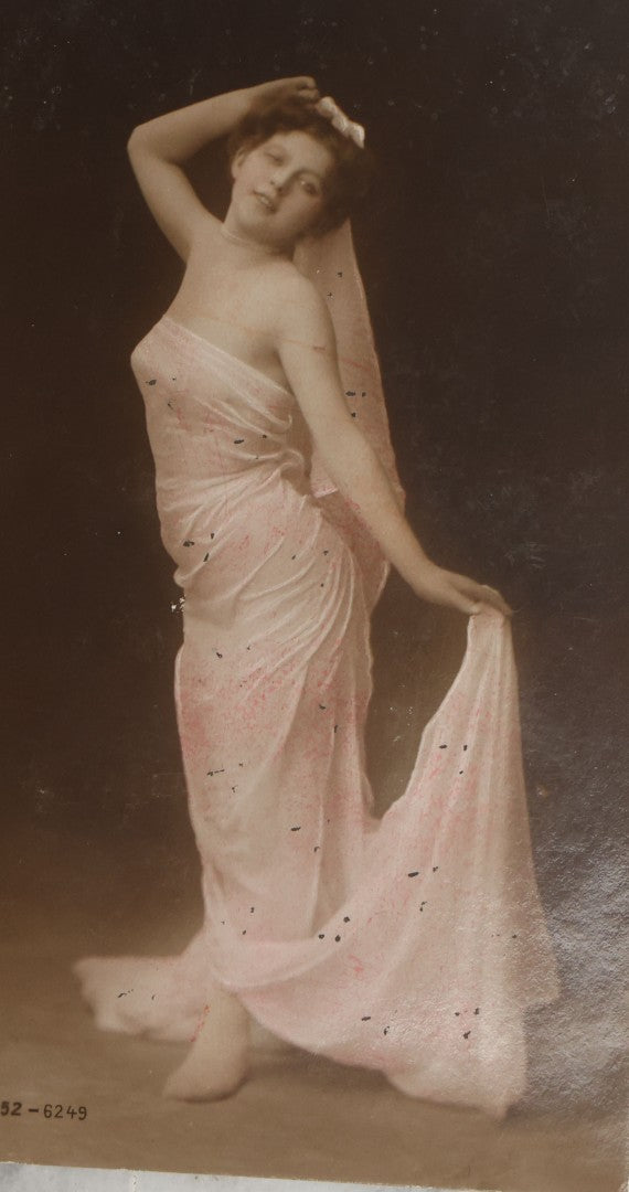 Lot 083 - Grouping Of Ten Antique And Vintage Photographic Postcards Of Women Including Cards With Green Tint, Girl With Flower In Her Hair, Etc., (Grouping C)