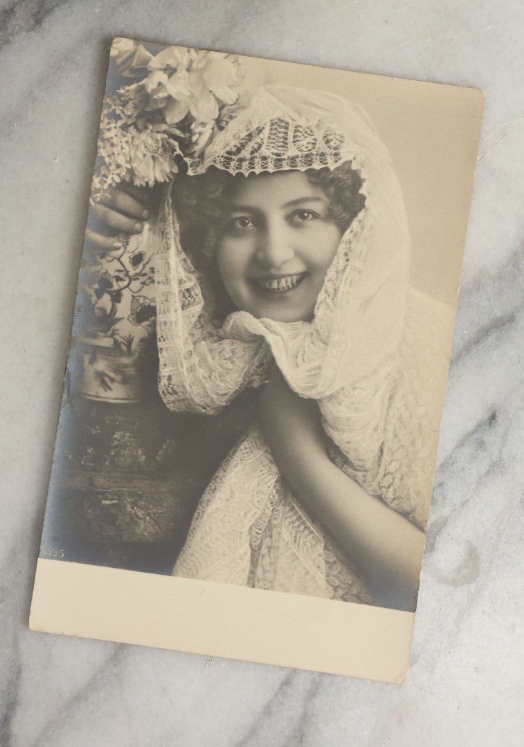 Lot 084 - Grouping Of Ten Antique And Vintage Photographic Postcards Of Women Including Woman In Garbage Pail Hat, French Beauty, "Hurry And Join Me," Etc., (Grouping D)