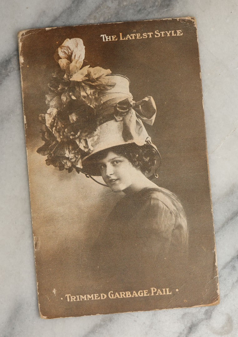 Lot 084 - Grouping Of Ten Antique And Vintage Photographic Postcards Of Women Including Woman In Garbage Pail Hat, French Beauty, "Hurry And Join Me," Etc., (Grouping D)