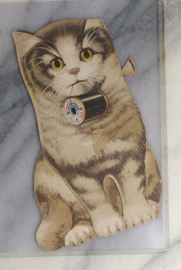 Lot 093 - Antique Die Cut Trade Card With Cat Advertising Corticelli Silk, Corticelli Silk Mills, Florence, Massachusetts, Printed By The P.H. Warren Co., Boston, Note Damaged Ear