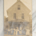 Lot 094 - Antique Occupational Real Photo Postcard R.P.P.C. Of The Proprietors And Workers Of A General Store Outside The Building, Sign Reads "Buck"