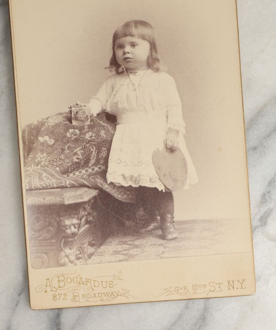 Lot 098 - Grouping Of Five Antique Cabinet Cards Including A Memorial Card For William Wood, Died 1889, And Four Photographs Including A Little Girl With An Artist's Palette