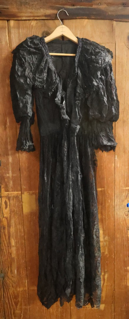 Lot 001 - Three Piece Antique Victorian Mourning Black Lace Ensemble Including Gown, Shawl, And Skirt Topper