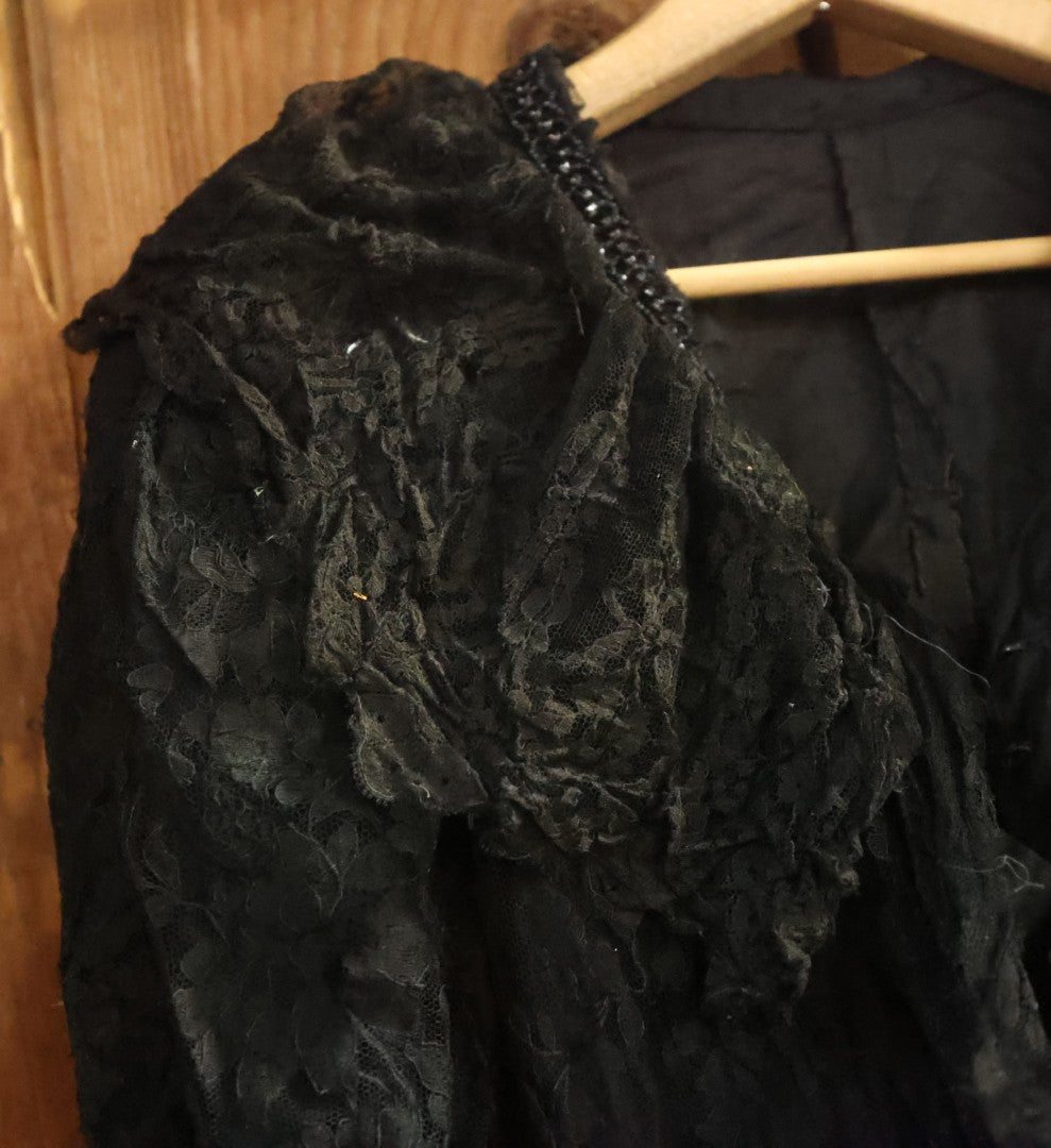 Lot 001 - Three Piece Antique Victorian Mourning Black Lace Ensemble Including Gown, Shawl, And Skirt Topper