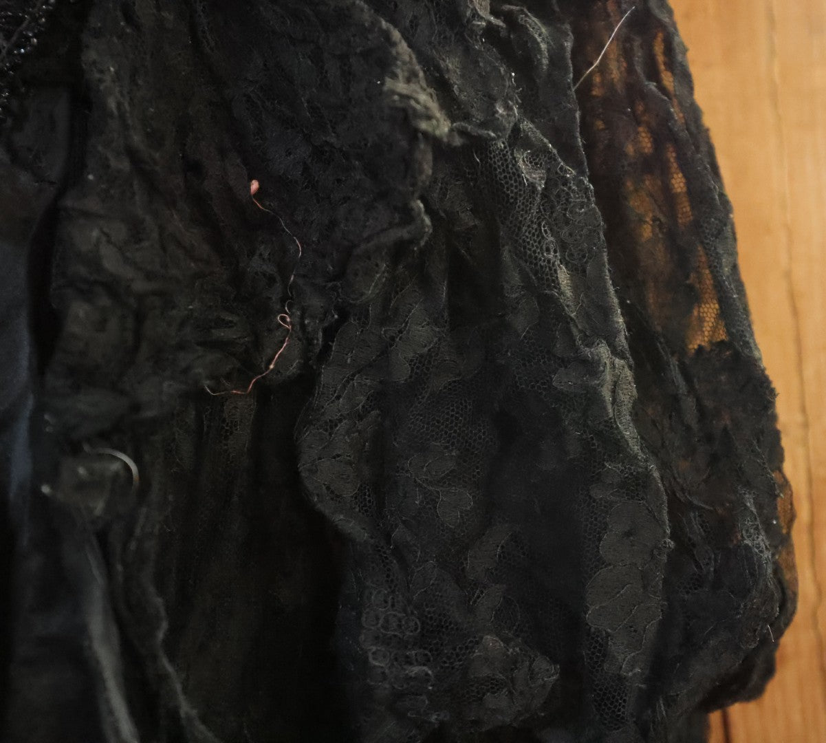 Lot 001 - Three Piece Antique Victorian Mourning Black Lace Ensemble Including Gown, Shawl, And Skirt Topper