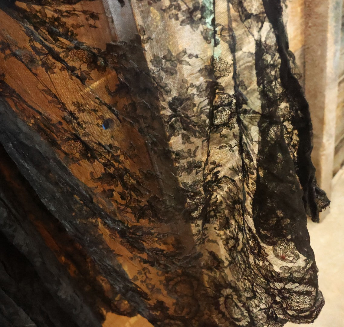Lot 001 - Three Piece Antique Victorian Mourning Black Lace Ensemble Including Gown, Shawl, And Skirt Topper