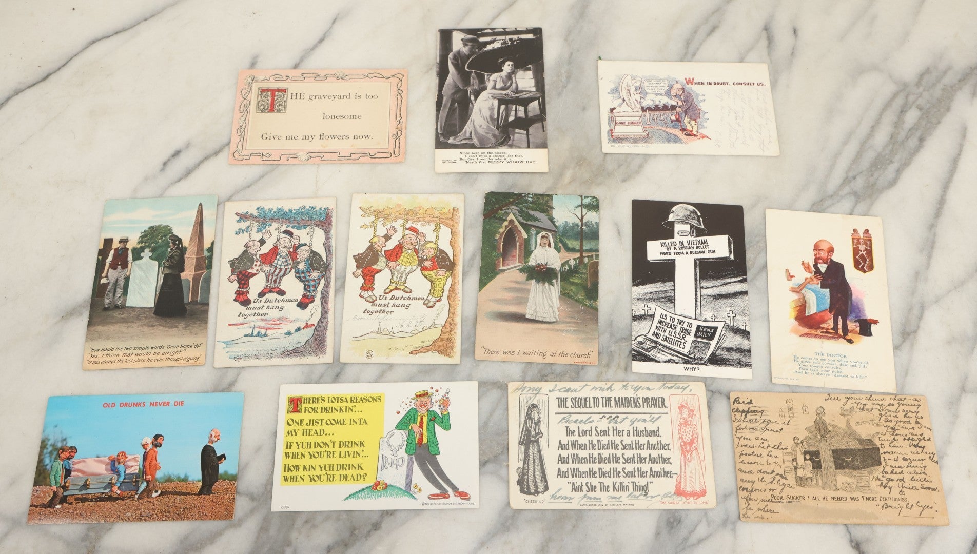 Lot 150 - Grouping Of Thirteen Antique And Vintage Death And Funeral Related Postcards, Including "The Graveyard Is So Too Lonesome, Give Me My Flowers Now"