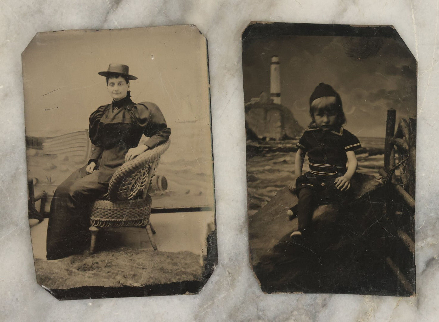 Lot 154 - Pair Of Antique Tintype Photographs Of People Posing In Front Of Beach Themed Backdrop, Woman And Child
