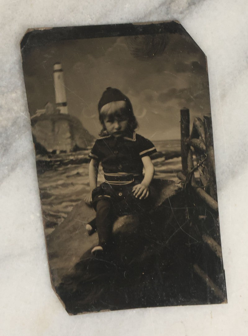 Lot 154 - Pair Of Antique Tintype Photographs Of People Posing In Front Of Beach Themed Backdrop, Woman And Child