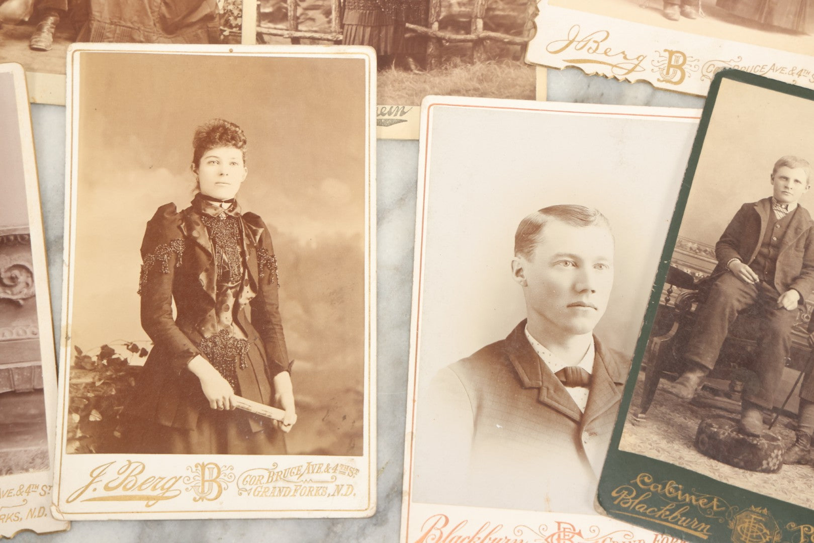 Lot 158 - Grouping Of 28 Antique Cabinet Card Photographs Of Men, Women, And Children