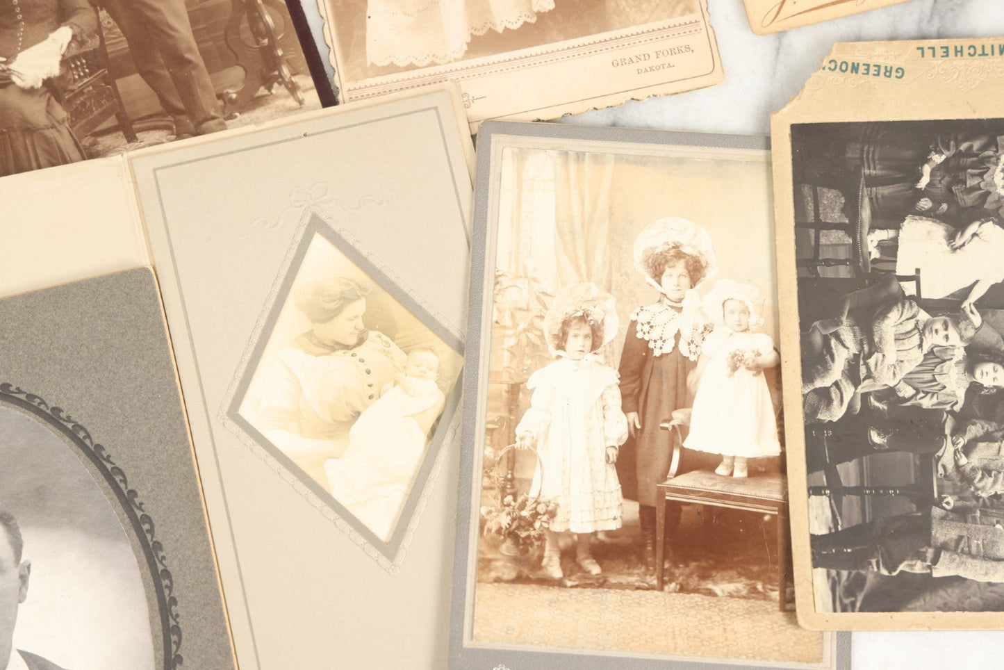 Lot 158 - Grouping Of 28 Antique Cabinet Card Photographs Of Men, Women, And Children