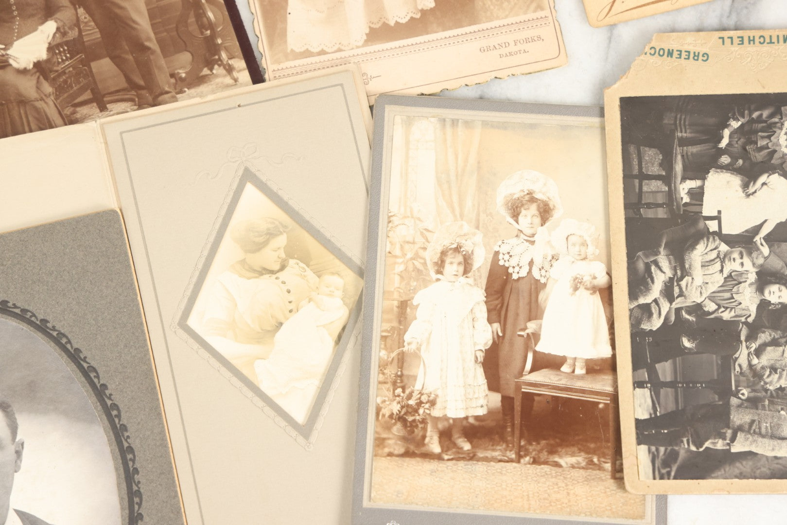 Lot 158 - Grouping Of 28 Antique Cabinet Card Photographs Of Men, Women, And Children
