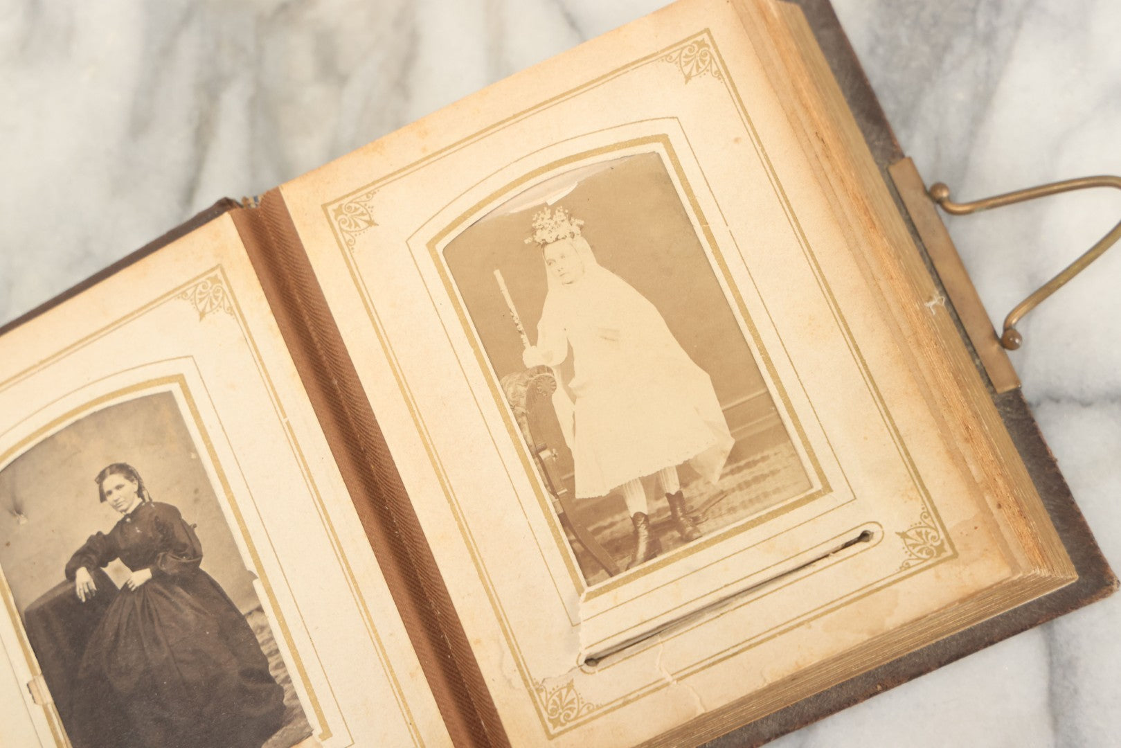 Lot 159 - Antique Victorian Photo Album With 25 Carte De Visite C.D.V. Photographs Including Young Girl On First Communion, Man In Top Hat, Note Spine Covering Loose