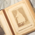 Lot 159 - Antique Victorian Photo Album With 25 Carte De Visite C.D.V. Photographs Including Young Girl On First Communion, Man In Top Hat, Note Spine Covering Loose