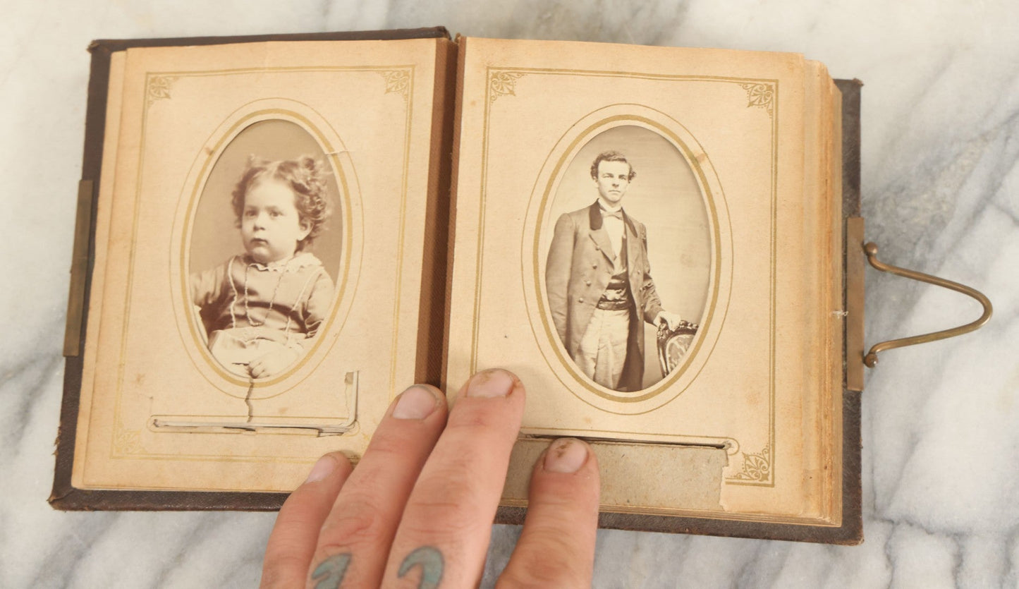 Lot 159 - Antique Victorian Photo Album With 25 Carte De Visite C.D.V. Photographs Including Young Girl On First Communion, Man In Top Hat, Note Spine Covering Loose