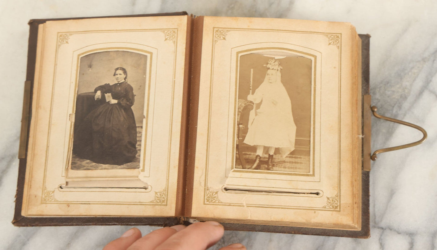 Lot 159 - Antique Victorian Photo Album With 25 Carte De Visite C.D.V. Photographs Including Young Girl On First Communion, Man In Top Hat, Note Spine Covering Loose