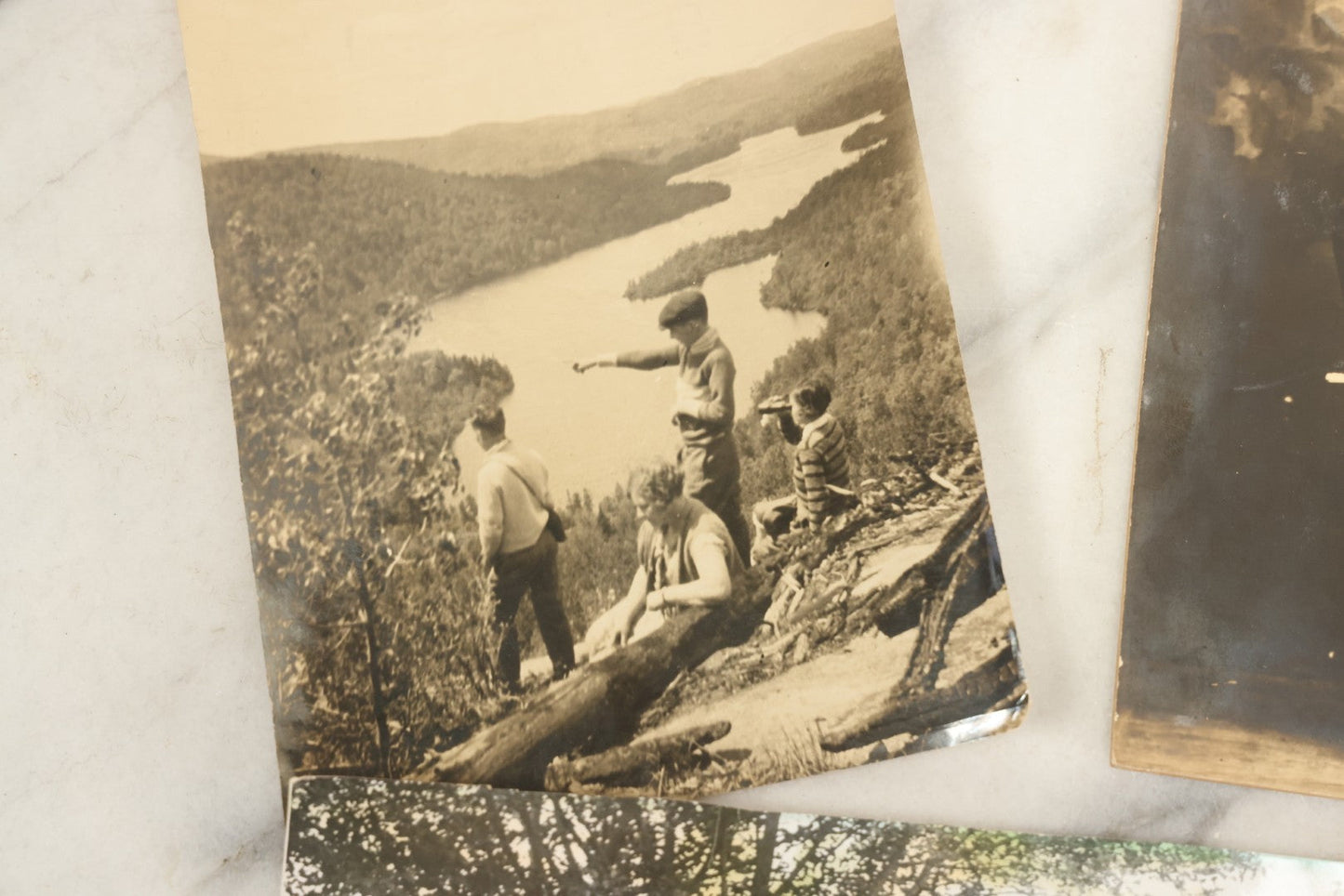 Lot 162 - Grouping Of 6 Snapshot And Other Photos Of Boy In Uniform, Camping Trip, People By Lake, People Behind Wagon