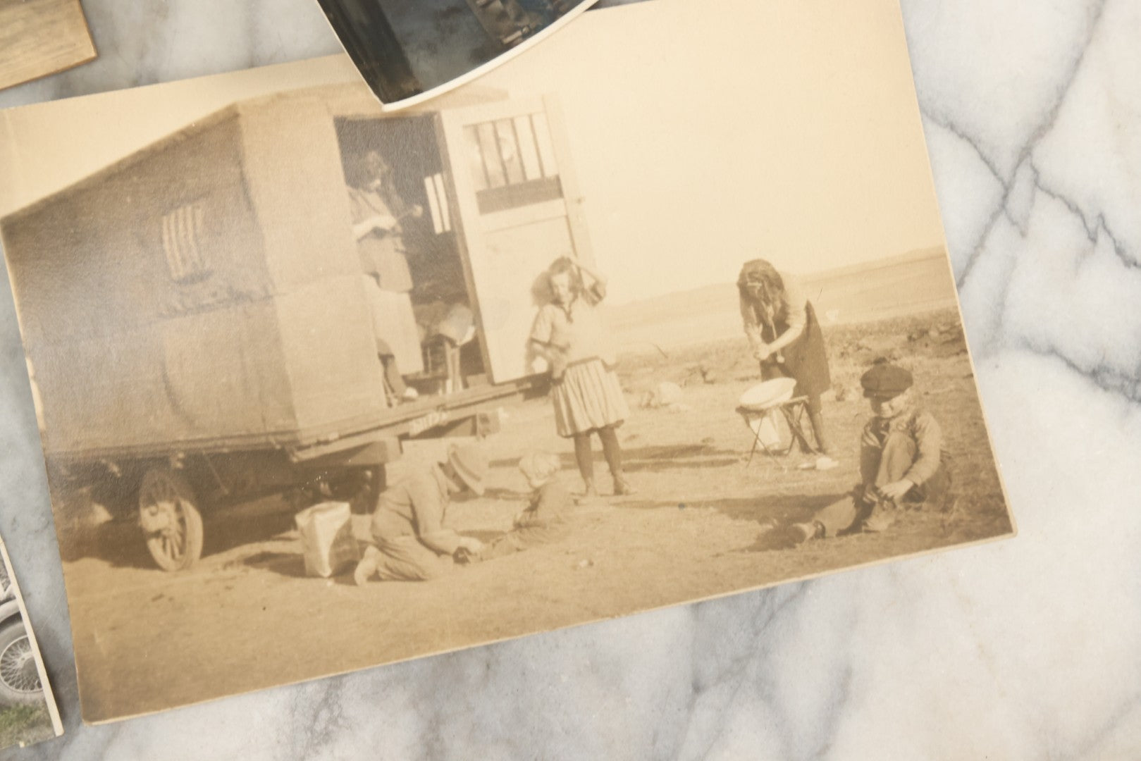 Lot 162 - Grouping Of 6 Snapshot And Other Photos Of Boy In Uniform, Camping Trip, People By Lake, People Behind Wagon