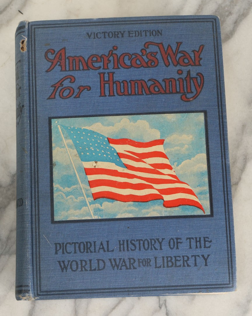 Lot 171 - "America's War For Humanity: A Pictorial History Of The World War For Liberty, Victory Edition" Antique World War One Book By Thomas H. Russell, Copyright 1919