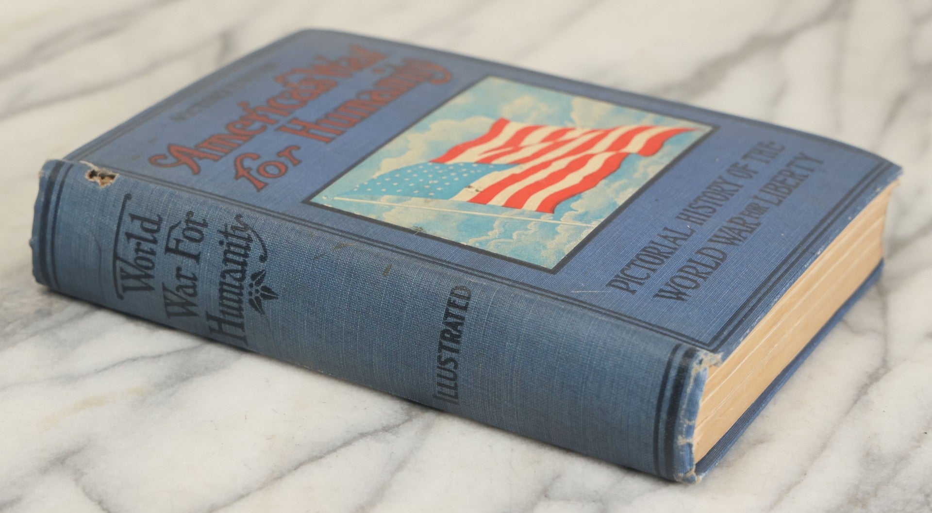 Lot 171 - "America's War For Humanity: A Pictorial History Of The World War For Liberty, Victory Edition" Antique World War One Book By Thomas H. Russell, Copyright 1919
