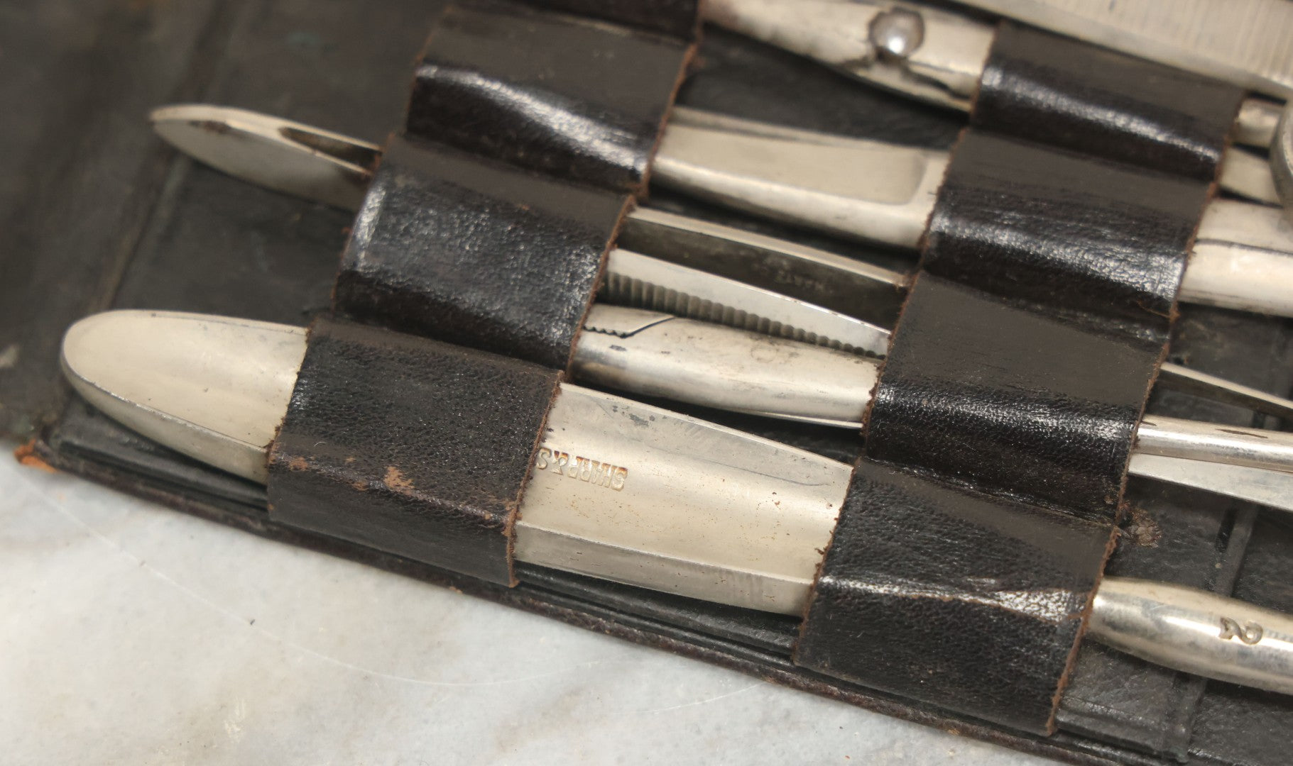 Lot 018 - Antique Sharp & Smith Surgical Instruments Kit In Fold Up Leather Case, 14 Pieces, As Found
