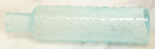 Lot 024 - Antique Mrs. Winslow's Soothing Syrup Medicine Bottle, Curtis & Perkins, Proprietors