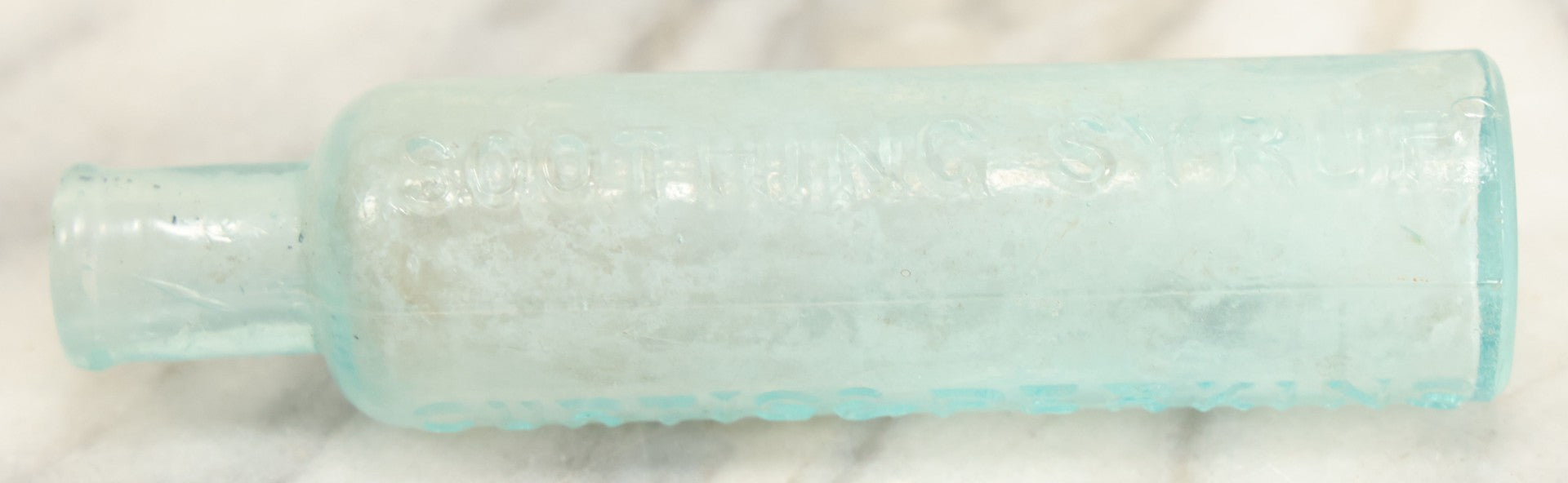 Lot 024 - Antique Mrs. Winslow's Soothing Syrup Medicine Bottle, Curtis & Perkins, Proprietors