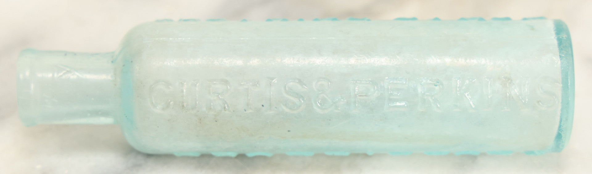 Lot 024 - Antique Mrs. Winslow's Soothing Syrup Medicine Bottle, Curtis & Perkins, Proprietors