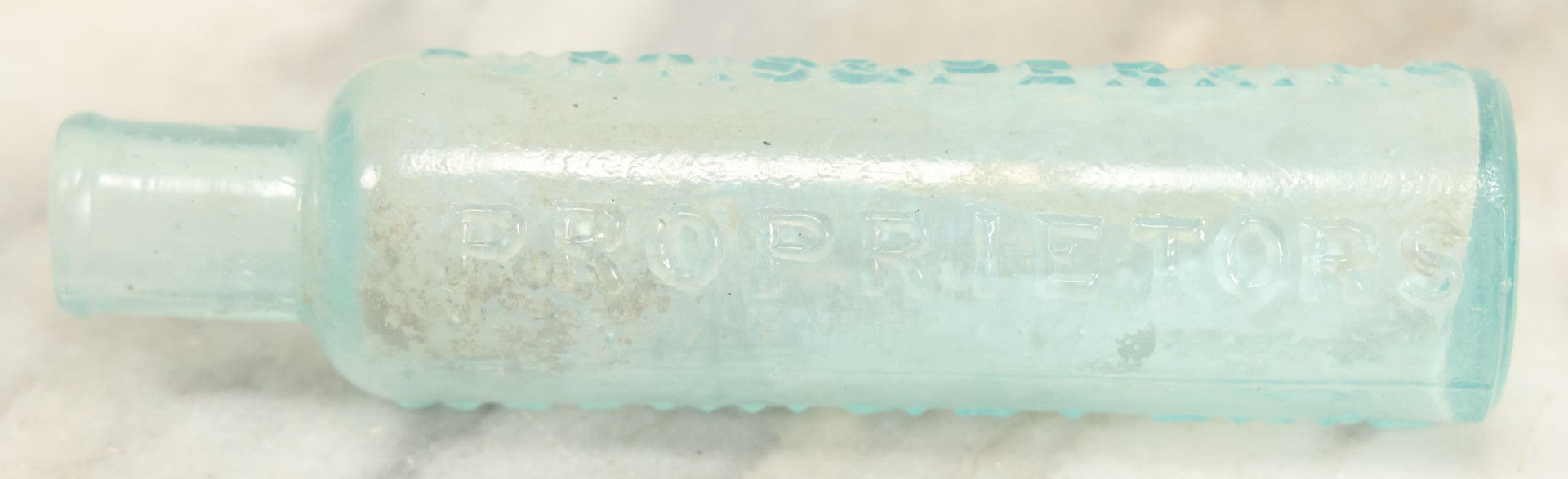 Lot 024 - Antique Mrs. Winslow's Soothing Syrup Medicine Bottle, Curtis & Perkins, Proprietors
