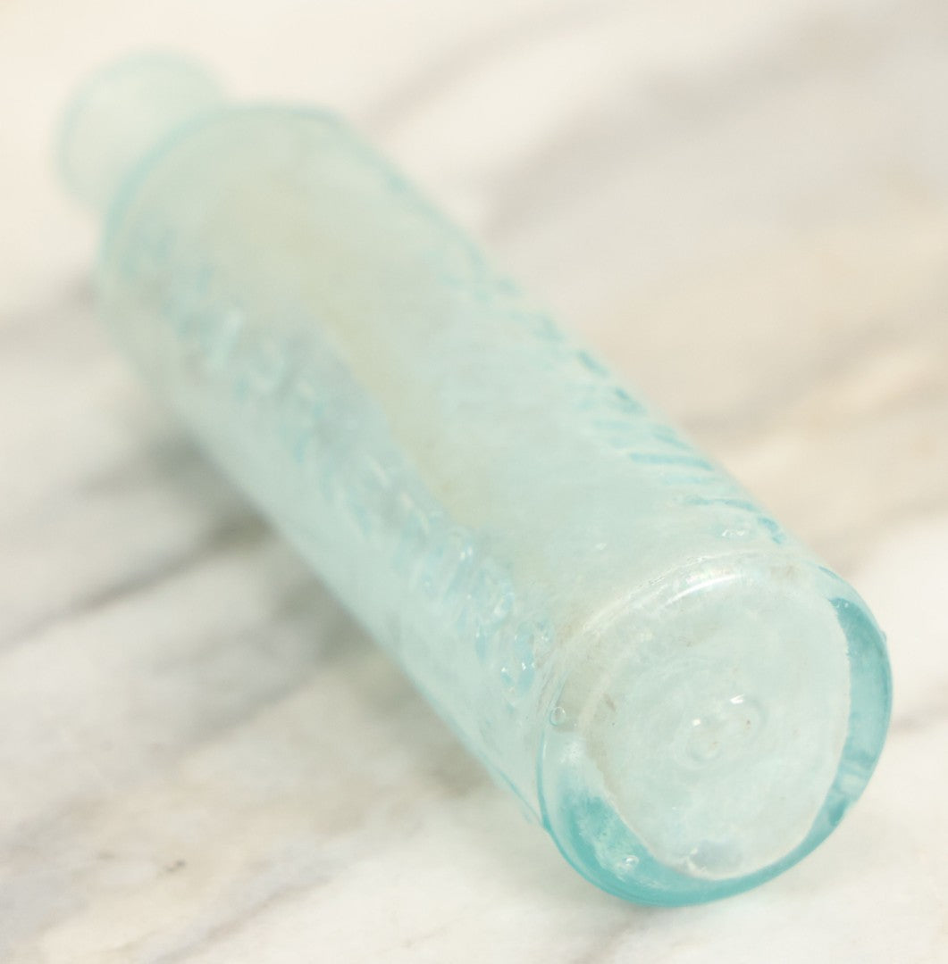 Lot 024 - Antique Mrs. Winslow's Soothing Syrup Medicine Bottle, Curtis & Perkins, Proprietors