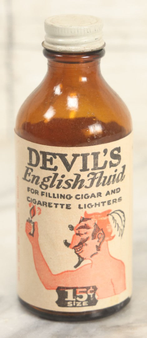 Lot 026 - Vintage Devil's English Fluid Lighter Fluid Bottle With Original Paper Label, Empty, By Devil Laboratories Co., Cincinnati Ohio, 15 Cent Size (B)