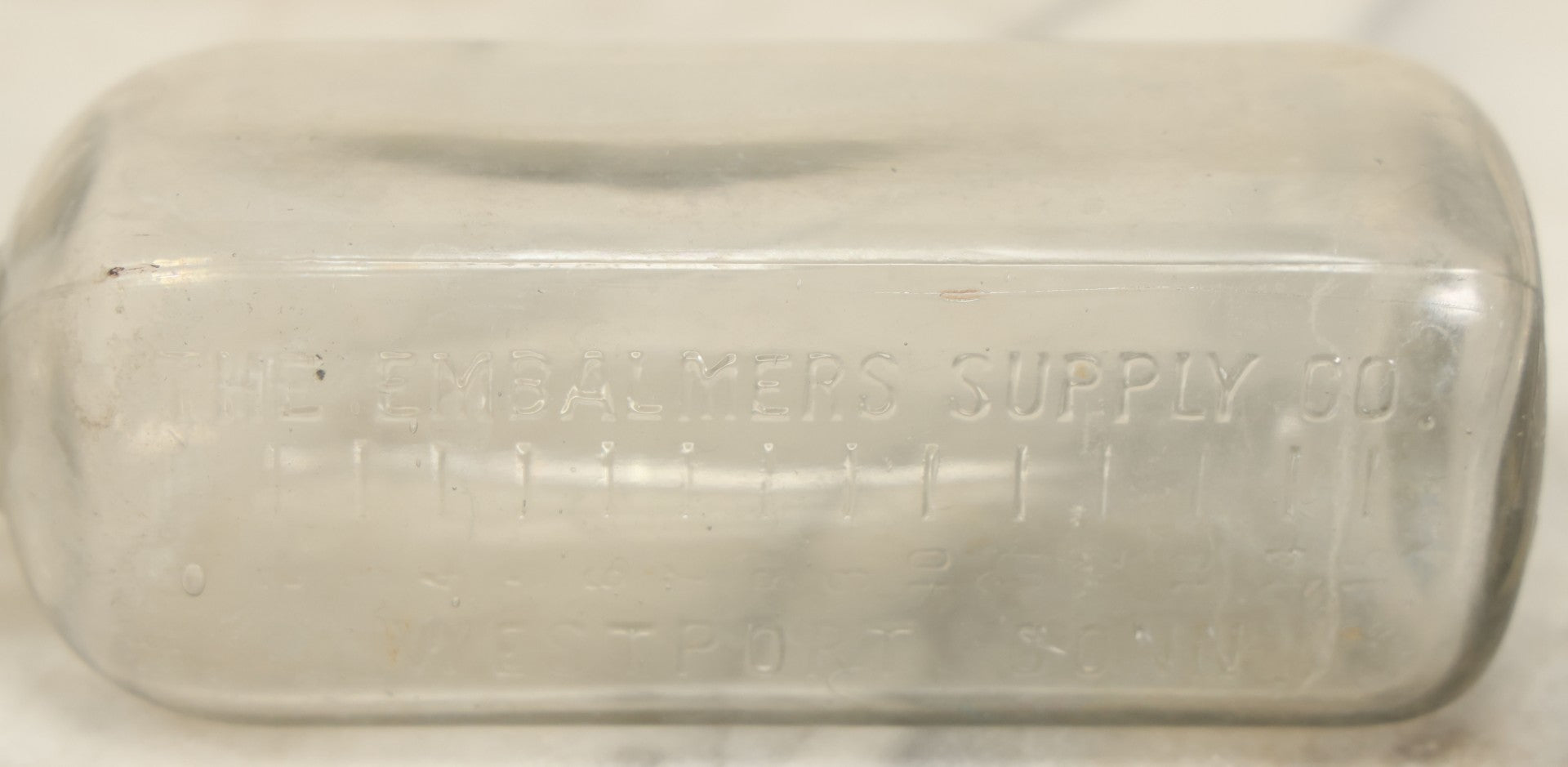 Lot 029 - Antique Embalming Fluid Bottle From The Embalmer's Supply Co., Westport, Connecticut