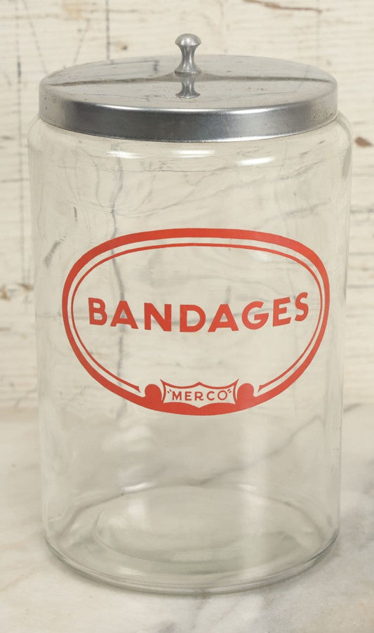 Lot 037 - Vintage Glass Doctor's Office Bandages "Merco" Brand Jar With Metal Lid Medical Decor