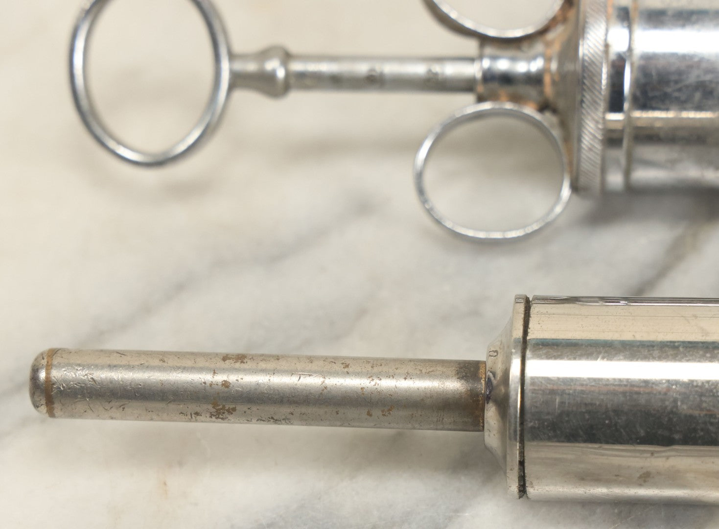 Lot 038 - Pair Of Antique Metal Syringes Including Empire By Becton, Dickinson, & Co., Rutherford, New Jersey