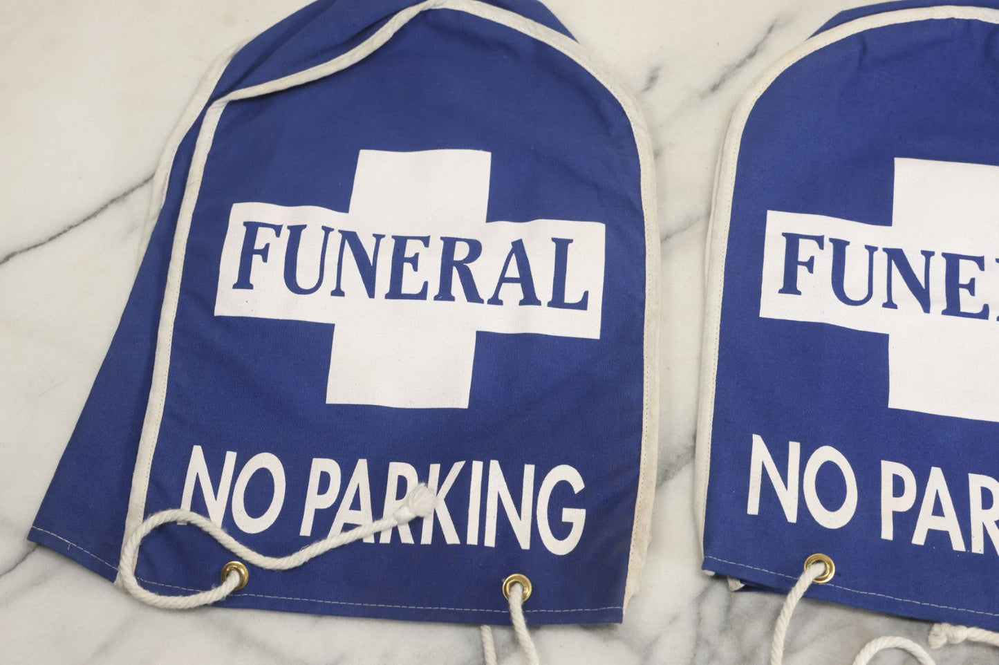 Lot 044 - Grouping Of Three Modern Blue Canvas Funeral Home No Parking Meter Covers
