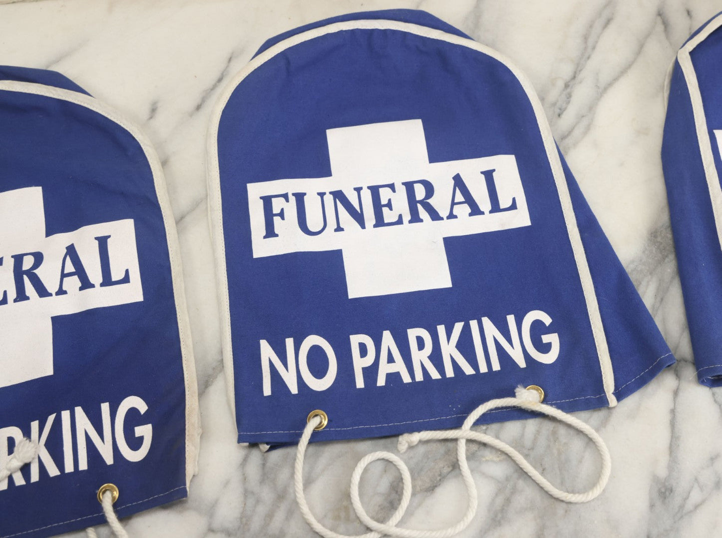 Lot 044 - Grouping Of Three Modern Blue Canvas Funeral Home No Parking Meter Covers