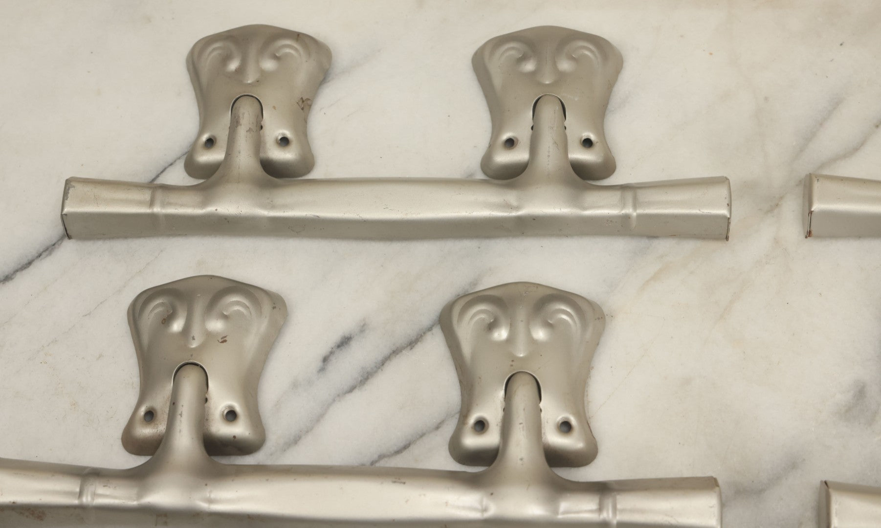 Lot 050 - Grouping Of Six New Old Stock N.O.S. Tin Metal Decorative Funeral Casket Handles