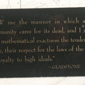 Lot 052 - Vintage Glass Funeral Home Display Sign With Quote From Gladstone, "Show Me The Manner In Which A Nation Or Community Cares For Its Dead," By Progressive Merchandisers Guild, Inc.