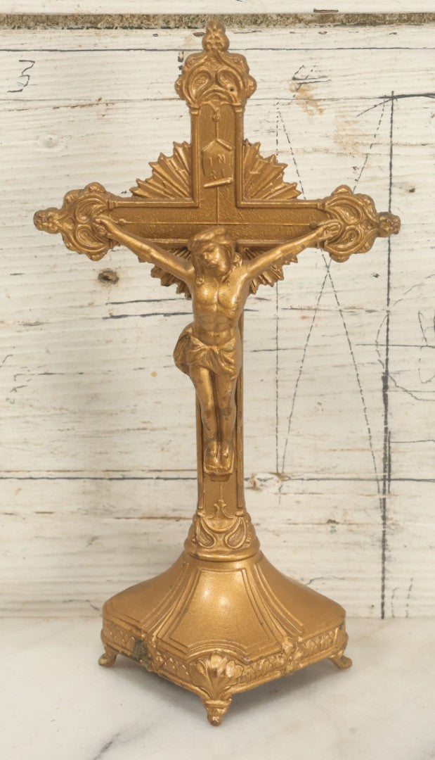 Lot 059 - Pair Of Cast Metal Gold Painted Crucifixes, One Free Standing On Base, One Wall Hanging