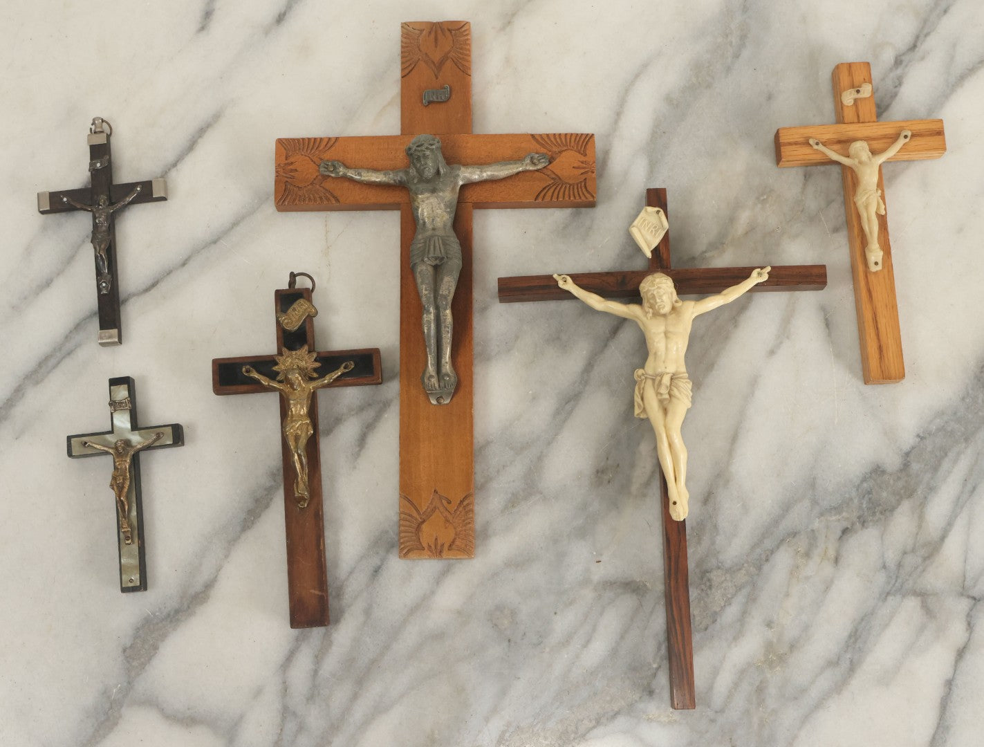 Lot 061 - Grouping Of Six Assorted Wooden Crucifixes, Mostly Plain, Some With Detailing