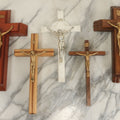 Lot 062 - Grouping Of Five Assorted Wood And Plastic Crucifixes Including Two Last Rites Crucifixes With Contents
